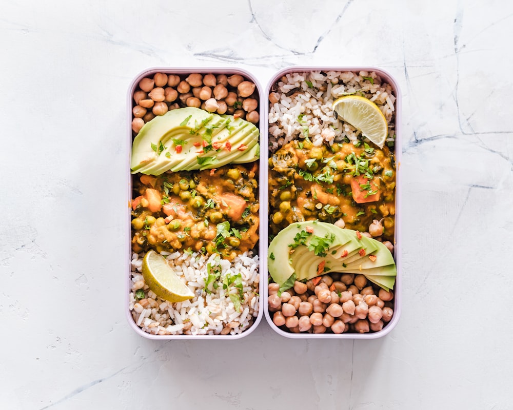 Fresh herbs and spices being combined in bowl